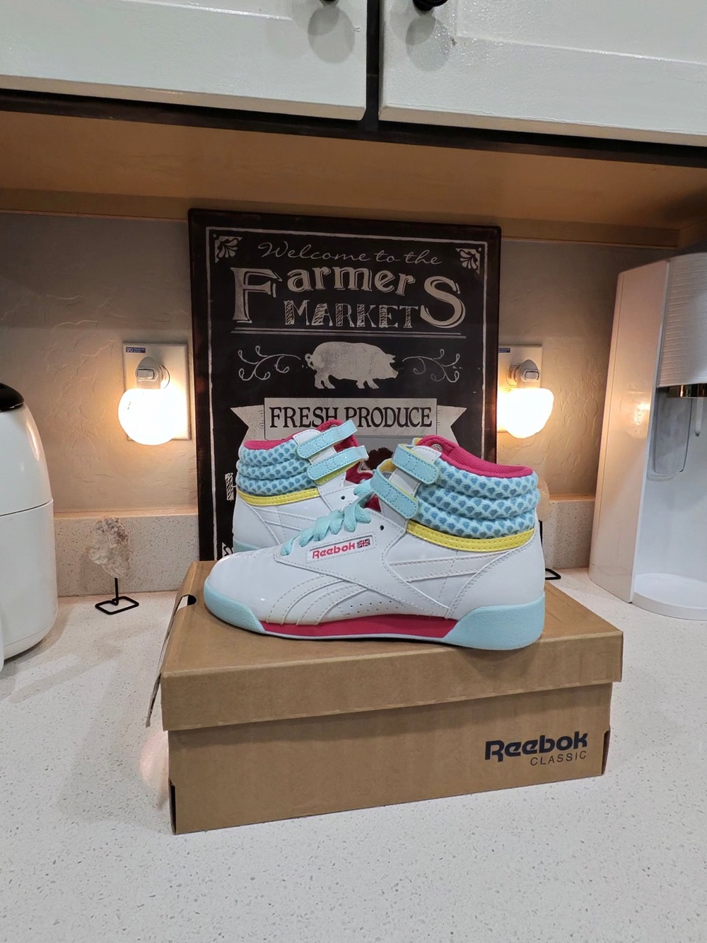 Reebok Kids High-Top Sneakers in White with Pink, Light Blue, and Yellow Accents